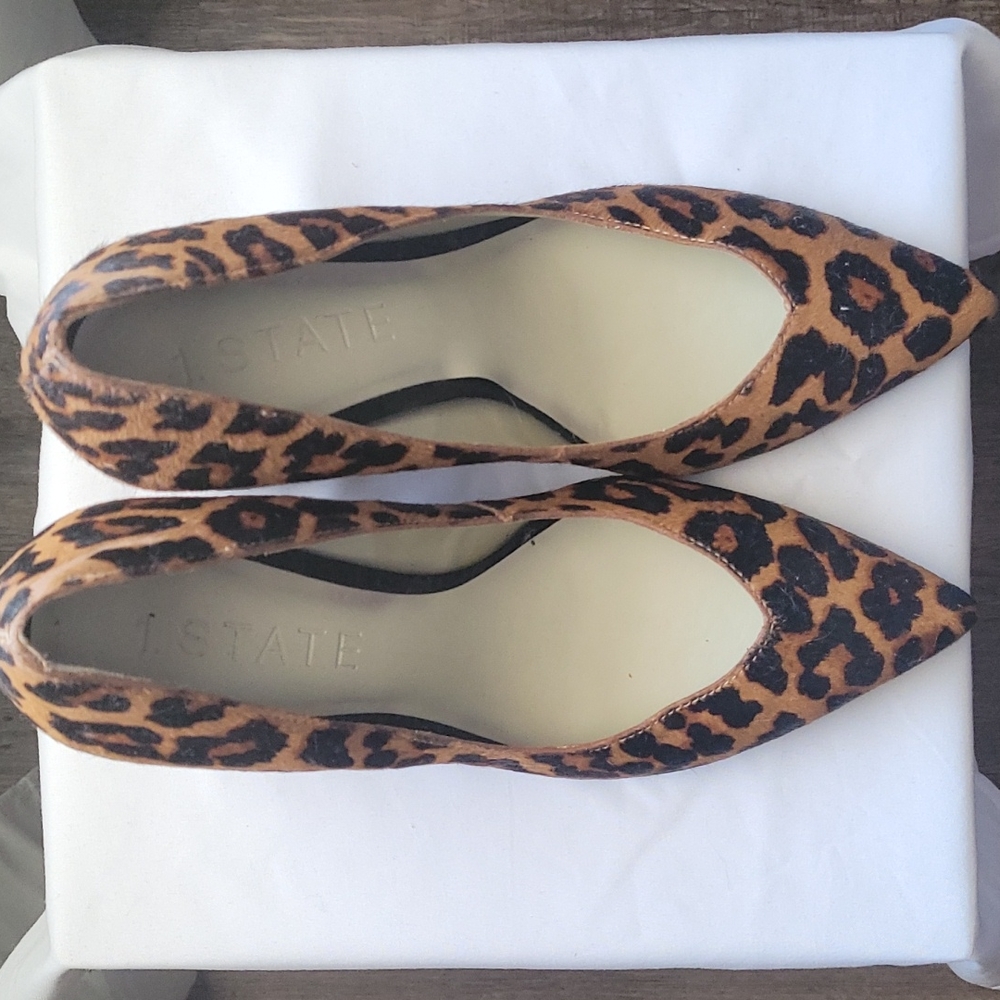 Statement heels to spicy up a look. Size 7.5M. Leapord print block heels
